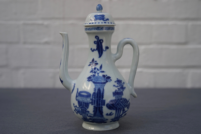 A Chinese blue and white ewer and cover with 'antiquities' design, Kangxi